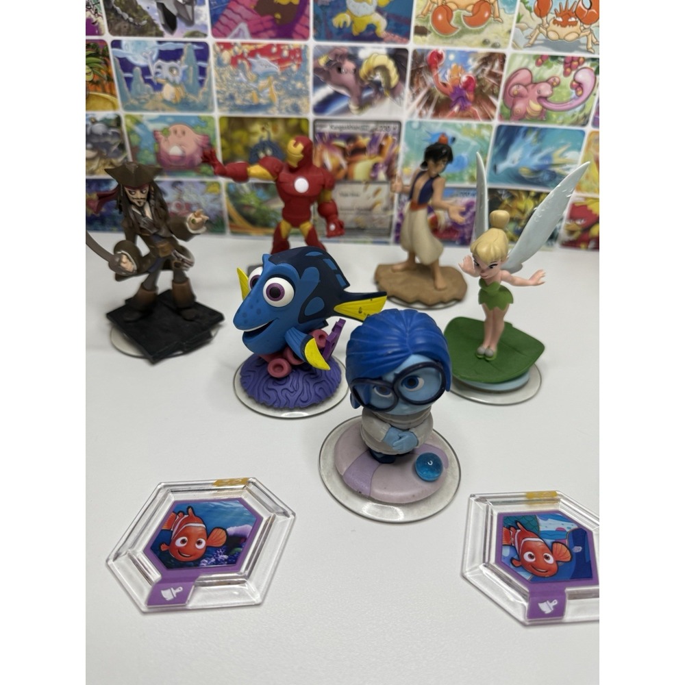 Disney Infinity Figure Lot Of 8 Iron Man Jack Sparrow Dory Sadness Tinker Bell